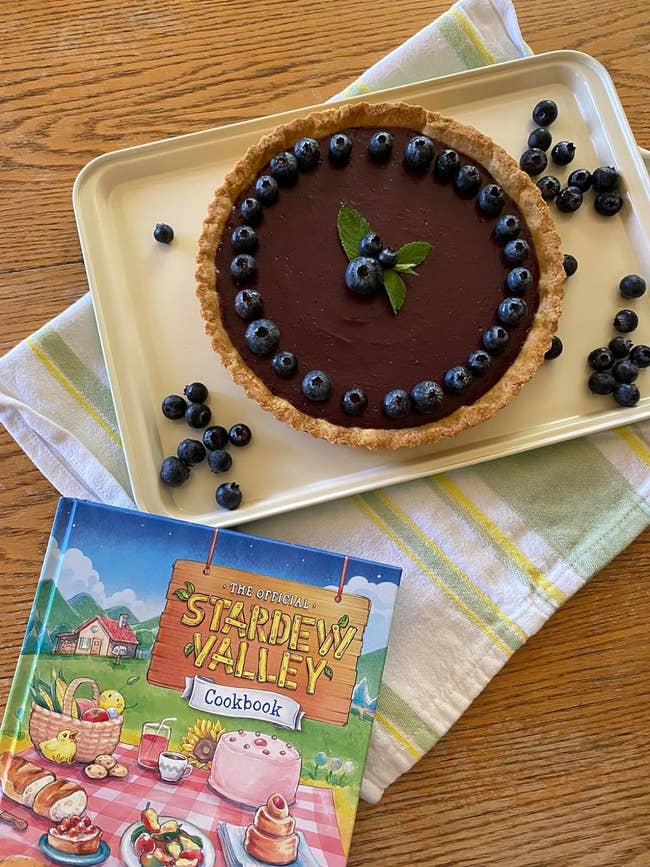 Pie with blueberries connected a tray adjacent to the