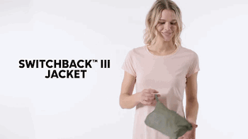 Model unfolding the travel jacket