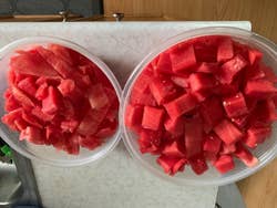 two bowls of perfectly cubed watermelon