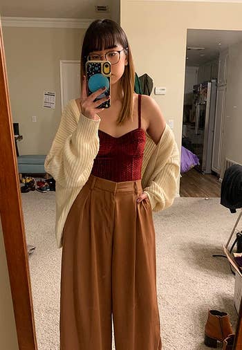reviewer wearing the brown palazzo pants