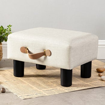 product image of white footstool with handle