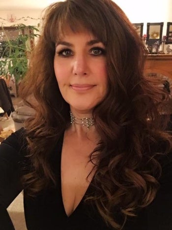 reviewer with curled hair that looks soft and moisturized