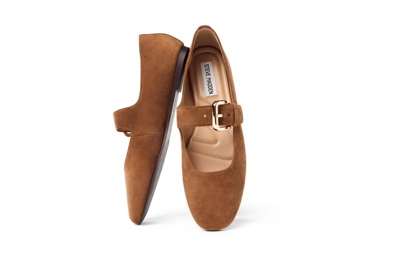 Pair of brownish  suede Steve Madden loafers with golden  buckle detail, suitable for casual and ceremonial  wear
