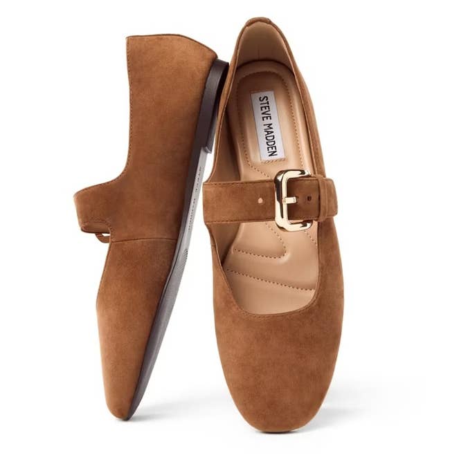 Pair of brownish suede Steve Madden loafers with golden buckle detail, suitable for casual and ceremonial wear