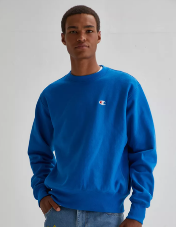 reviewer wearring the crewneck in blue