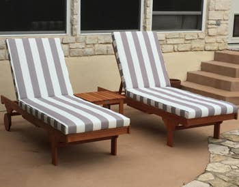 reviewer photo of two of the striped lounge chairs