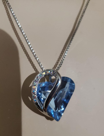Reviewer image of the blue heart necklace