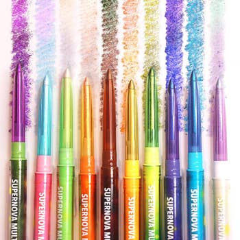 Twelve colorful Supernova multichrome gel markers lined up, each with a corresponding swatch showing shimmering effects on paper