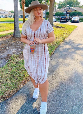 reviewer wearing the dress