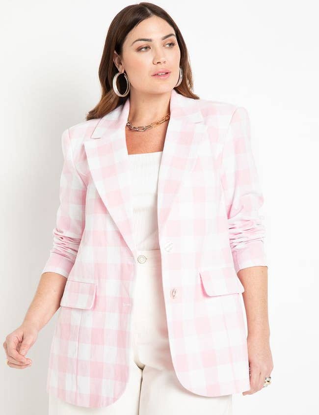 model in light pink and white blazer