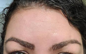 Reviewer's forehead after using the sheet with matte skin