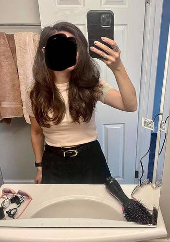 reviewer's blown out hair after using the brush