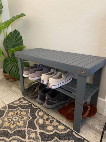 reviewer photo of blue shoe storage bench