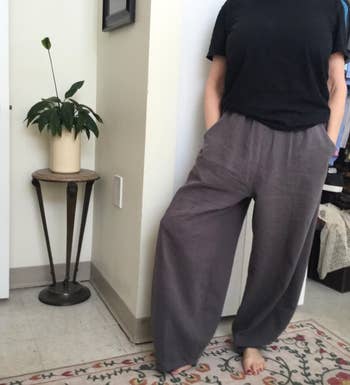 reviewer photo wearing the pants in gray