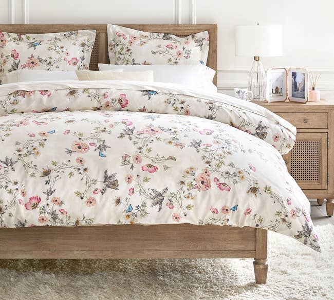 Floral patterned bedding set on a bed