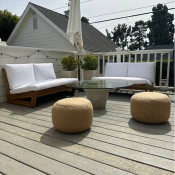 a pair of ottoman on a deck
