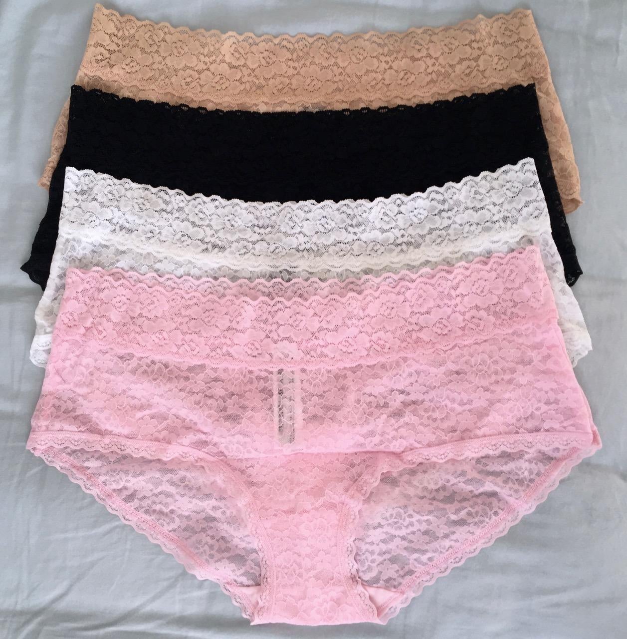 reviewer image of the four pack of lace underwear in pink, white, black, and nude