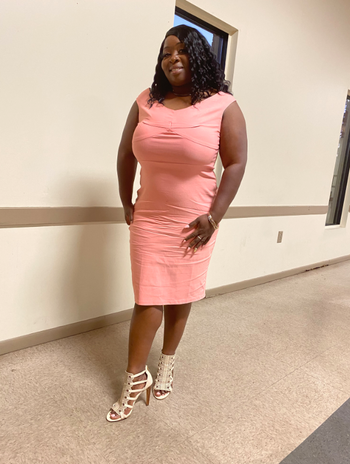 another reviewer wearing the dress