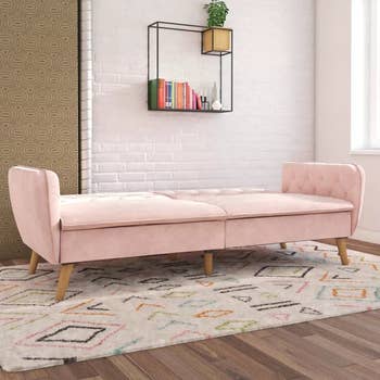 the pink futon laid lfat