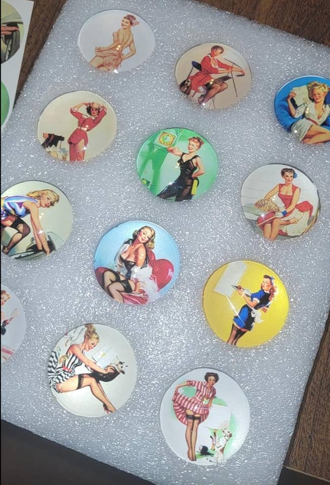 Round magnets featuring vintage illustrations of pinup girls in various outfits and poses 