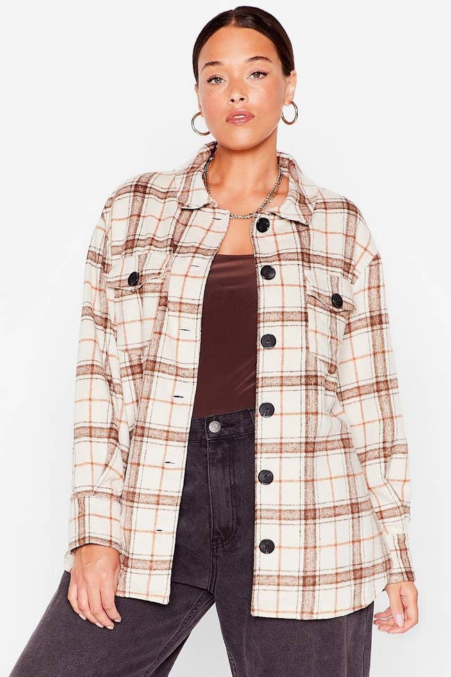 model wearing brown and cream plaid shacket