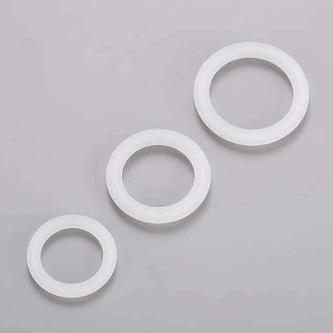 Three transparent cock rings in graduated sizes