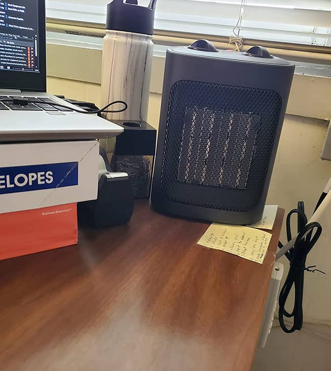 reviewer image of the small space heater sitting on a desk