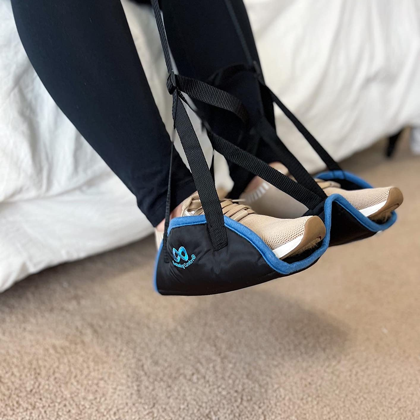 reviewer demonstrating their feet resting on the hammock
