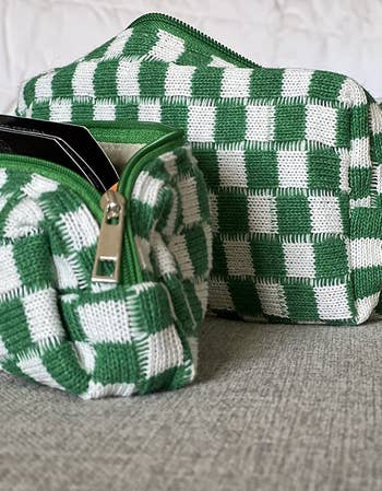 reviewer's two small zippered white and green checkered bags 
