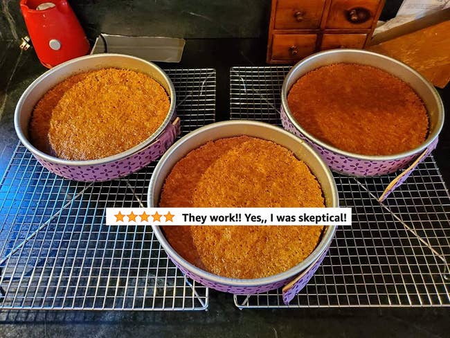 The strips wrapped around a reviewer's round cake pans with flat baked cakes and five star review text 