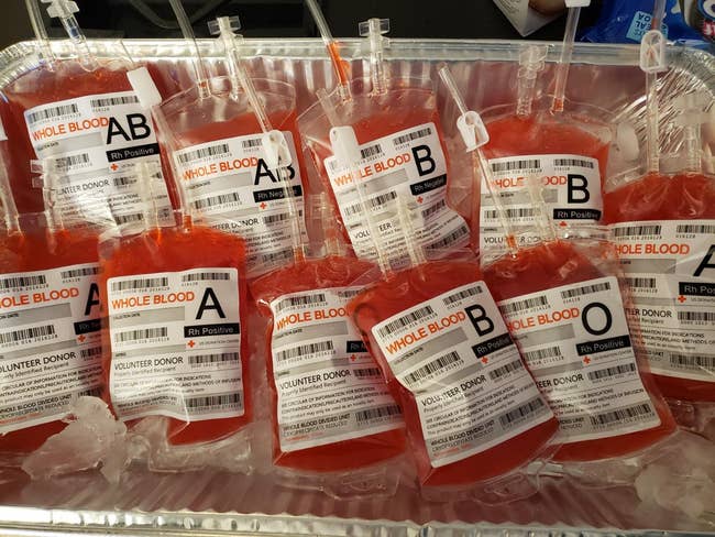 Bags labeled with antithetic  humor  types (A, B, AB, O) stored connected  ice