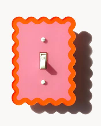 light power   screen  with a pinkish  and orangish  design