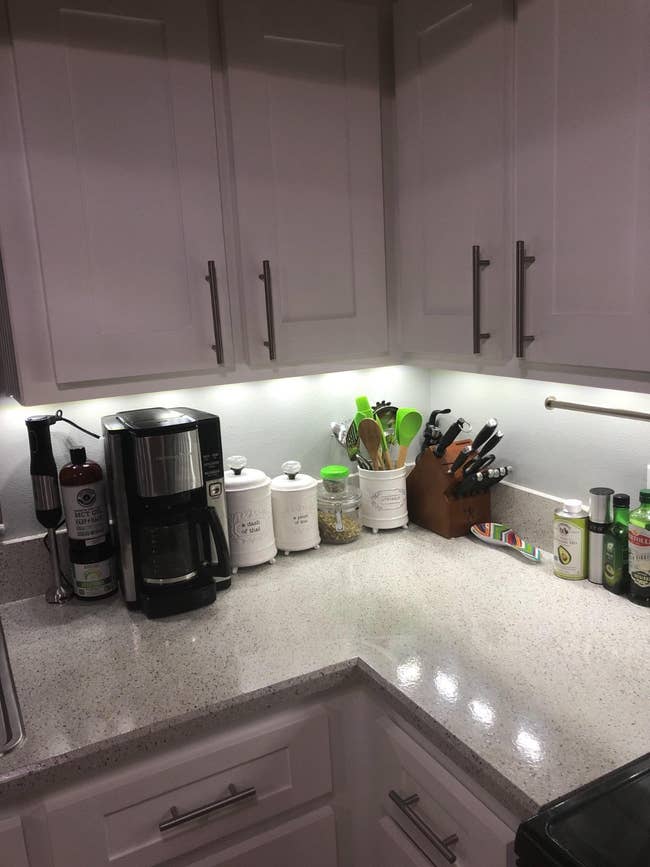 reviewer's kitchen counter with cool under-cabinet lights