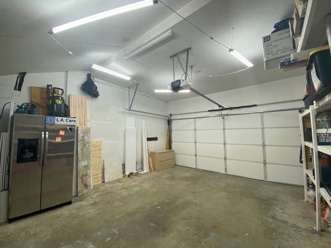 reviewer's garage shop that's very brightly lit from the ceiling mounted lights