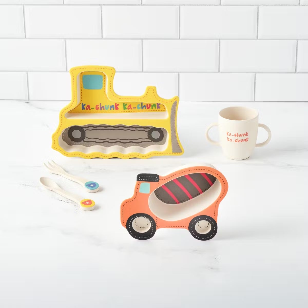 set of utensils and plates that look like construction tools and equipment