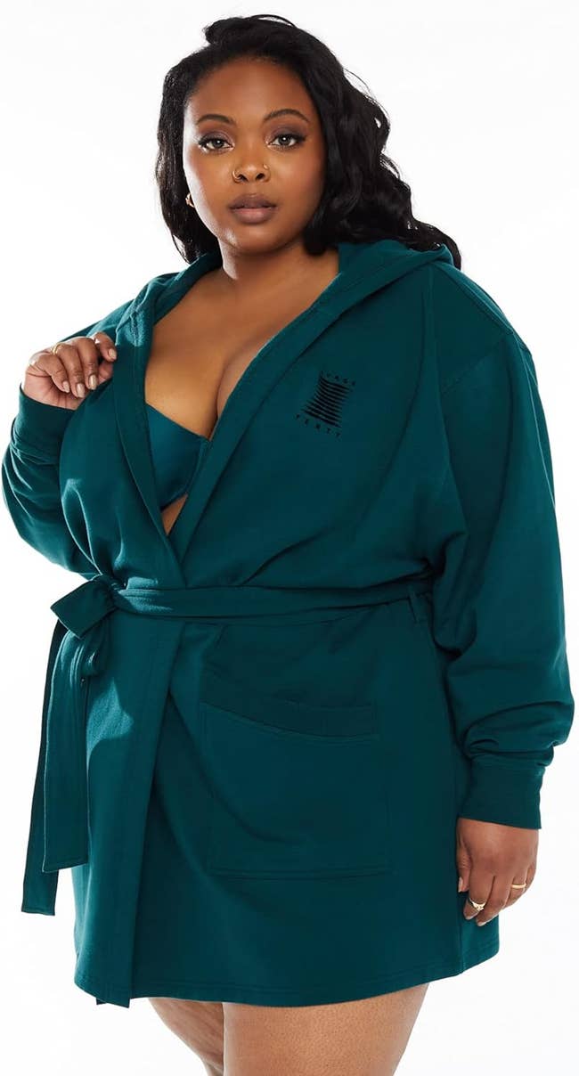 model wearing green shorty robe with hood