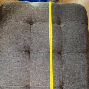 Two-tone sofa divided by a yellow vertical line