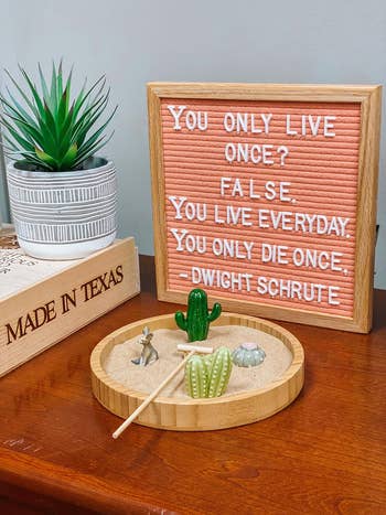 reviewers pink letter board with a quote from The Office on it