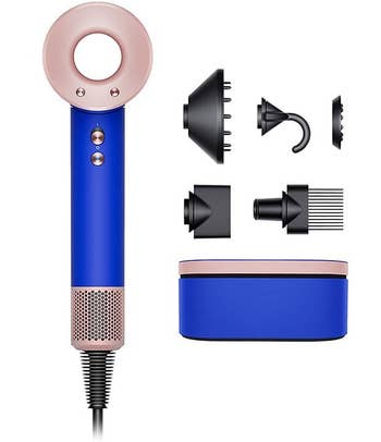 Dyson Supersonic hair dryer in blue with magnetic attachments and storage box