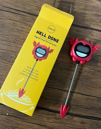 The thermometer next to the box showing that the end of it is a little red horn 