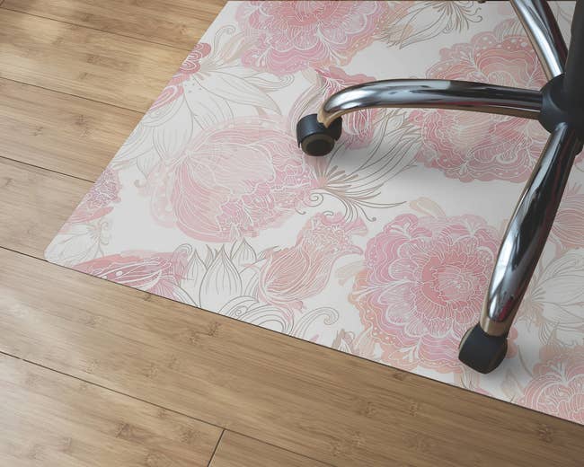 a close up of the floral print mat