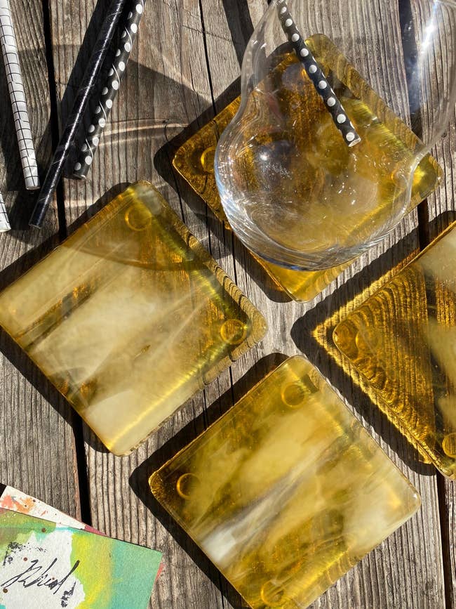 the lemon ice colored marbled glass coasters on a table