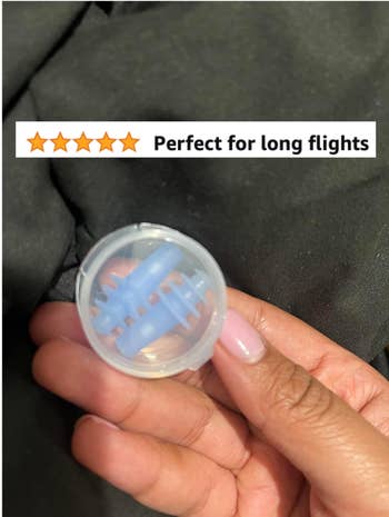 reviewer image of the silicone earplugs