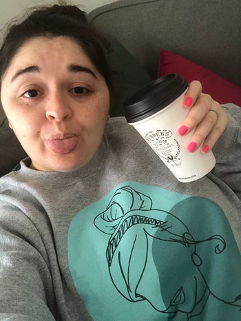 buzzfeed editor wearing the sweatshirt in gray