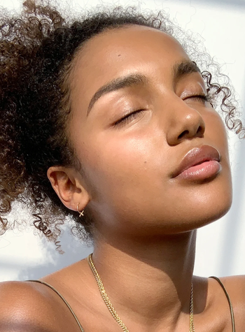 a model with glowing skin