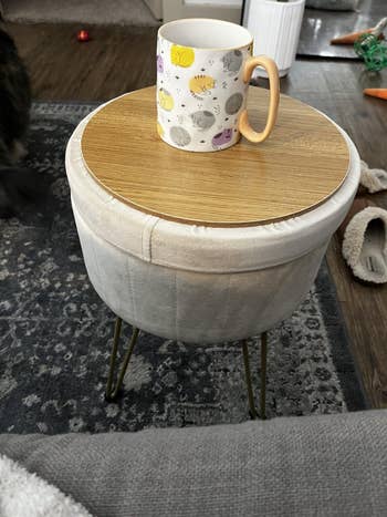 The ottoman with the apical  flipped to usage  arsenic  a table