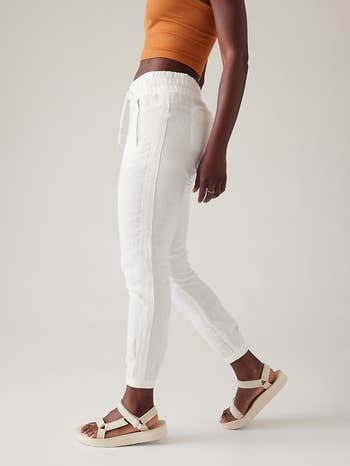 Image of model wearing white joggers