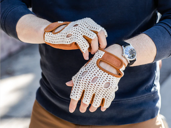 lifestyle image of model putting on crocheted bike gloves