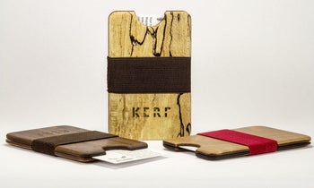 three different wood card holders