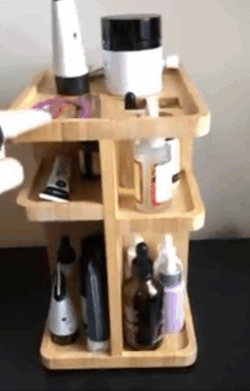 gif of a reviewer spinning the organizer, showing how many products fit on it